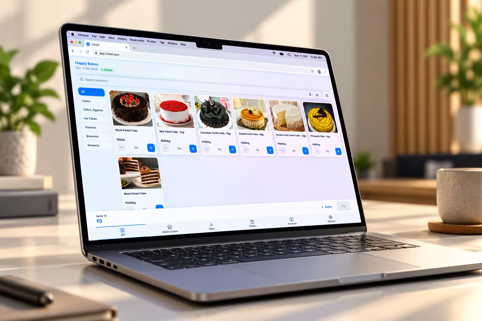 Shopkeeper managing retail sales with Vikibill on a laptop